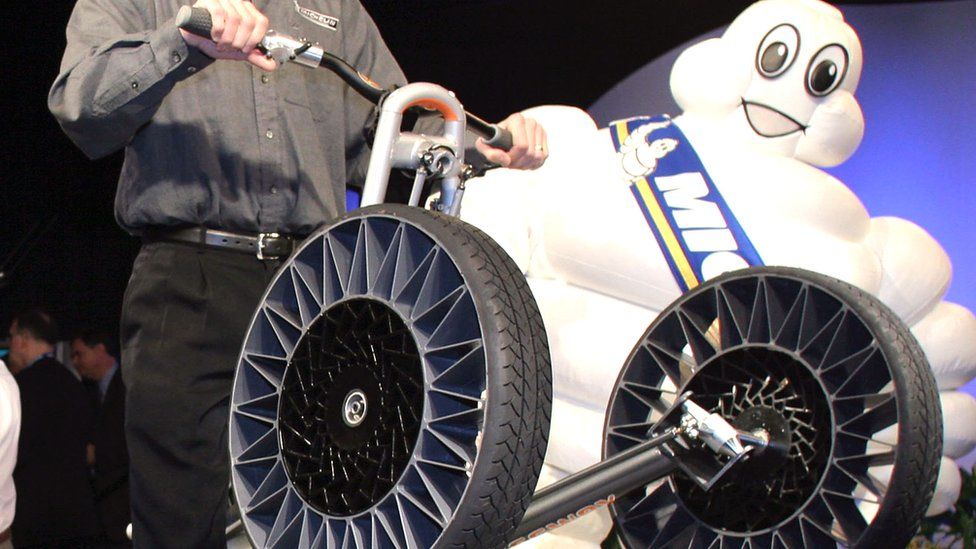 The Michelin "Tweel" tires are displayed on the Segway Concept Centaur (R) and the iBOT mobility systems at the 2005 North American International Auto Show January 9, 2005 in Detroit