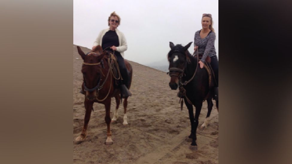 Bridget Davies and her daughter of horseback