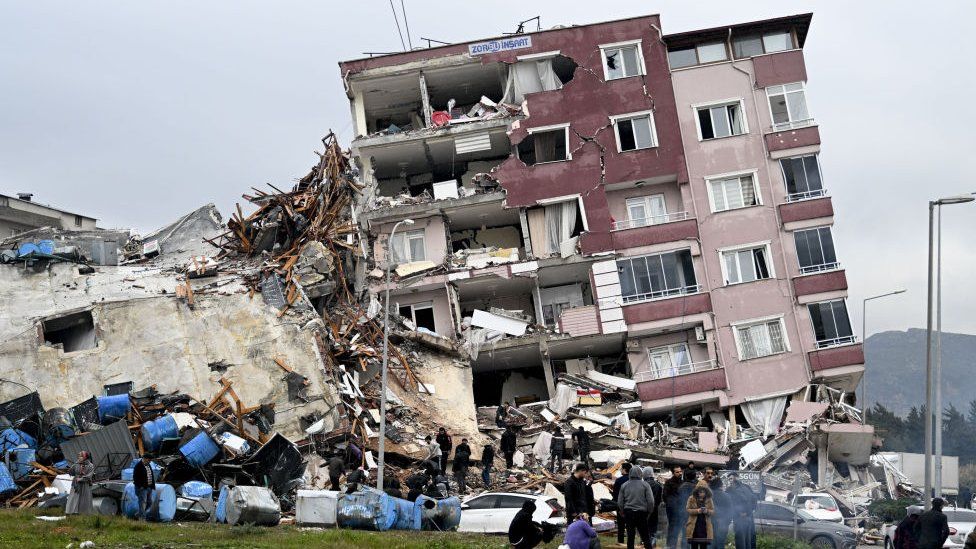A view of a collapsed building in Hatay, Turkiye after 7.7 and 7.6 magnitude earthquakes hits Turkiye's Hatay