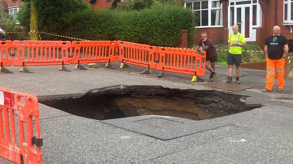 Prestwich sinkhole closes road after sewer collapses BBC News