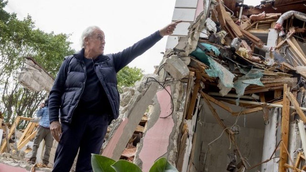 Christian de Berdouare, current owner of the mansion once owned by Colombian drug lord Pablo Escobar, looks on as the property is demolished, in Miami Beach, Florida, USA, 19 January 201