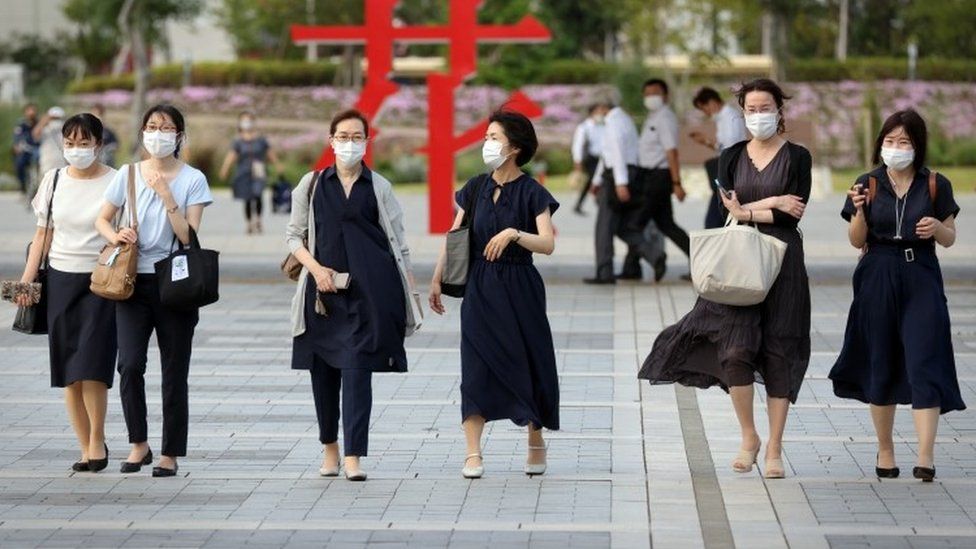 Japanese women wear masks in Tokyo