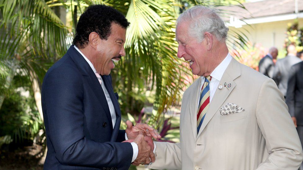 King Charles III (then the Prince of Wales) meeting singer Lionel Richie in 2019
