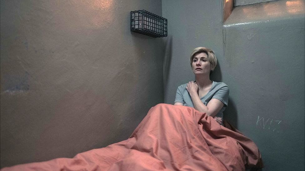 Orla, played by Jodie Whittaker sitting in a prison cell