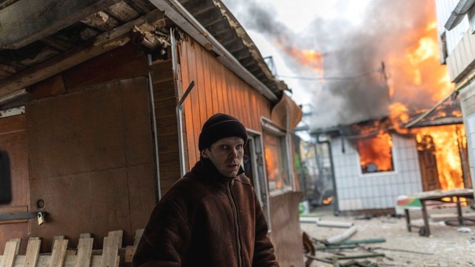 A resident in Irpin, near Kyiv, after the only escape route was shelled as Russian forces advance towards the capital