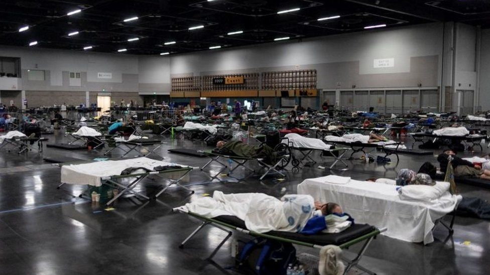 People sleep at a cooling centre set up in Portland in the US state of Oregon