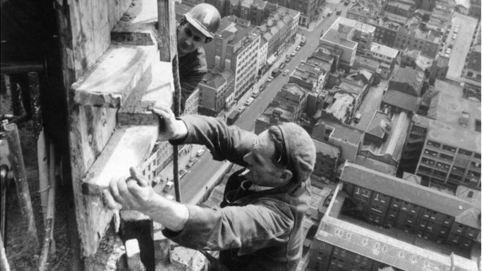 Steeplejacks constructing the central London tower