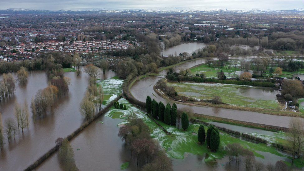 aerial view of Manchester with floodwaters and snow