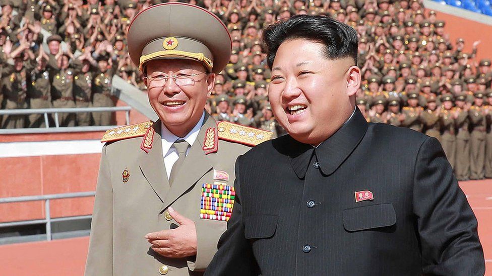 North Korean leader Kim Jong-un (R) with former chief of the Korean People's Army (KPA) General Staff Ri Yong-gil