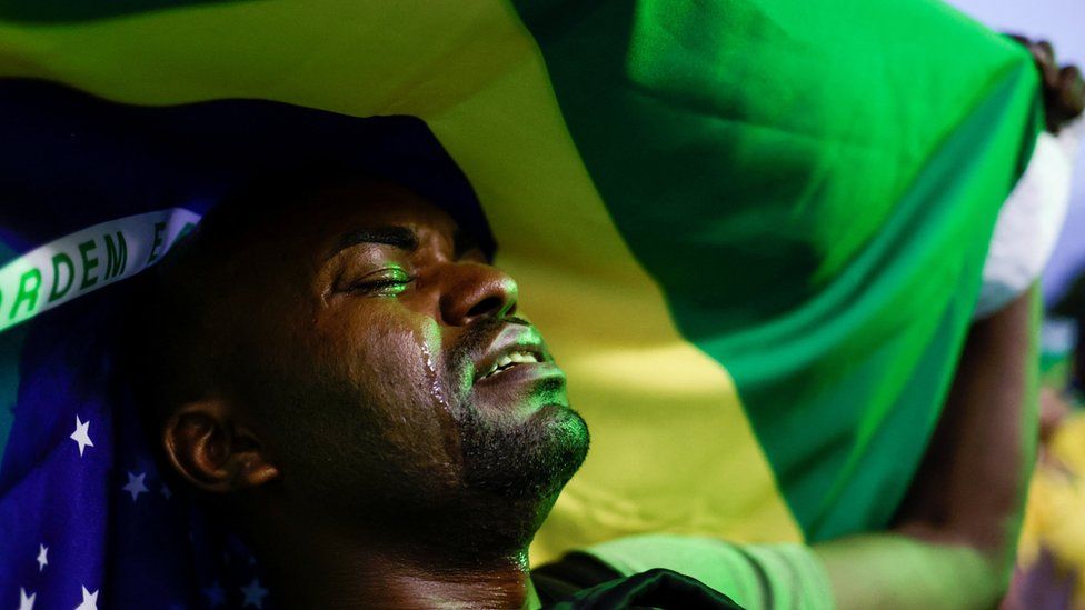 A supporter of Bolsonaro cries at the election result