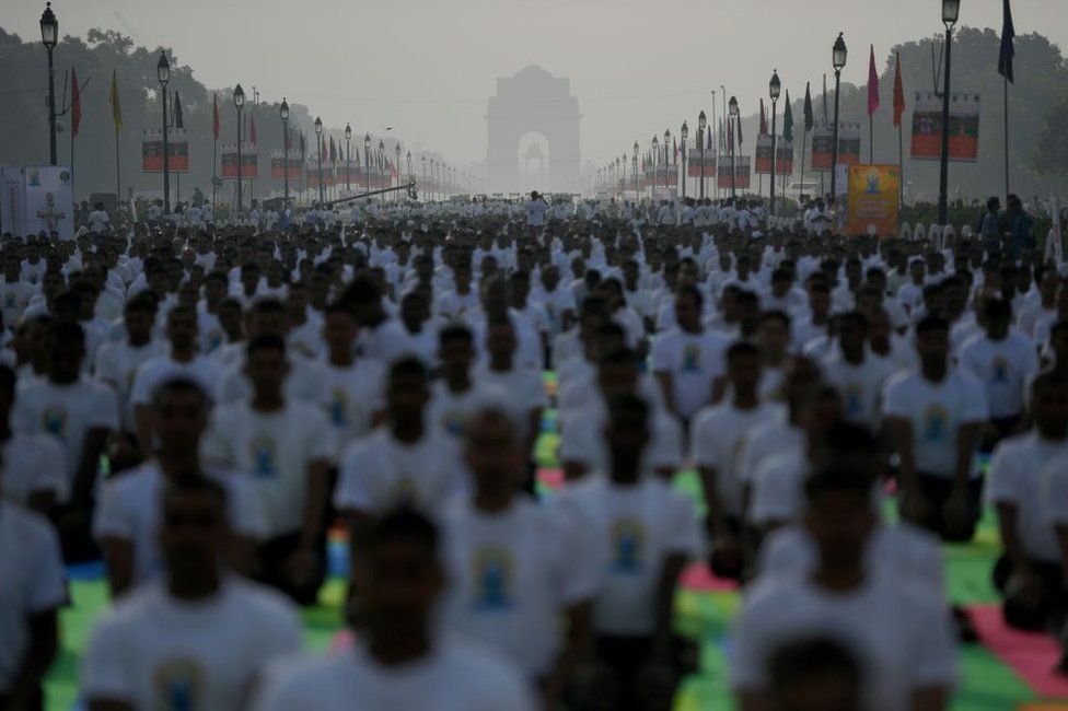 Indian yoga practitioners participate in a mass yoga session on International Yoga Day in New Delhi on June 21, 2019.
