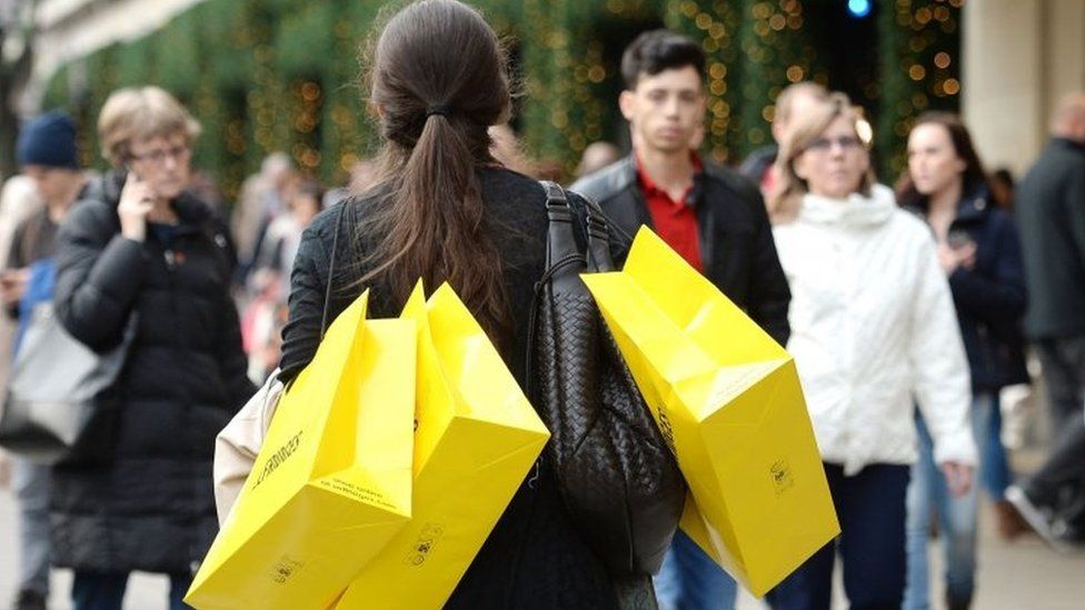 Shoppers, such as those on Oxford Street in London, have seen more discounts, experts said