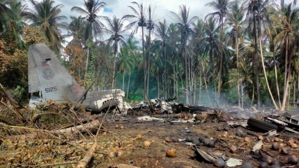 Site of military transporter plane crash in the Philippines, 4 July 2021