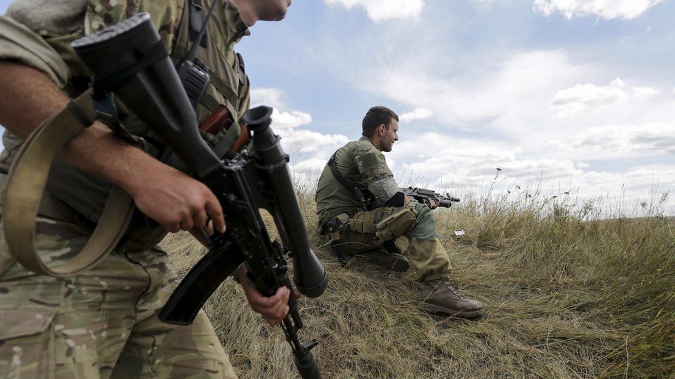 Ukrainian servicemen patrol area in Zaytseve village, near Gorlovka of Donetsk area, Ukraine, 21 August 2015