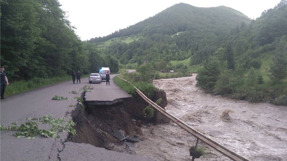 A road destroyed by flooding in Ukraine