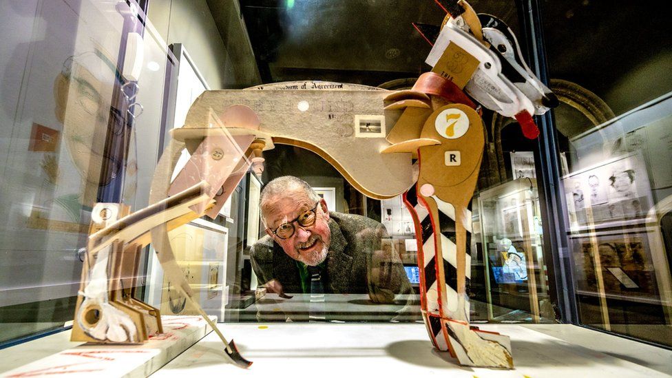 David Hughes with his sculpture of a dog