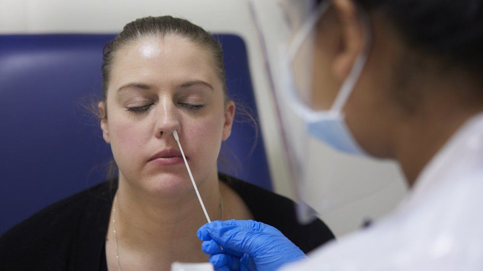 Boots to offer 12-minute turnaround on Covid nasal swab test - BBC News