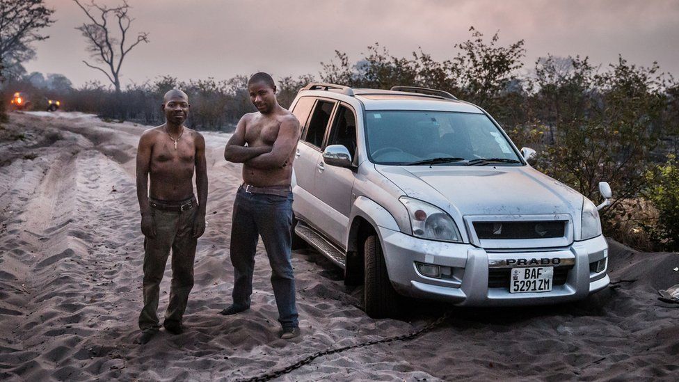 Zambian aid worker Robert Ntitima (right) and driver Clinton Bakala