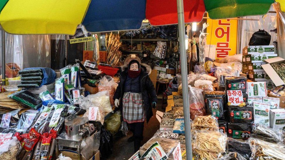 A street vendor in Namseong Market, Seoul.