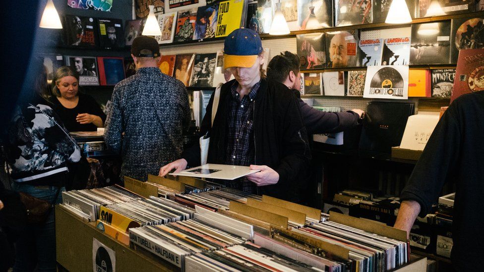 People buying vinyl records