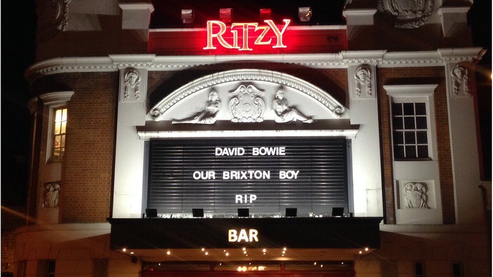 The signs at two of Brixton landmarks - the Ritzy Cinema and the Brixton Academy - are also paying tribute to their local boy.