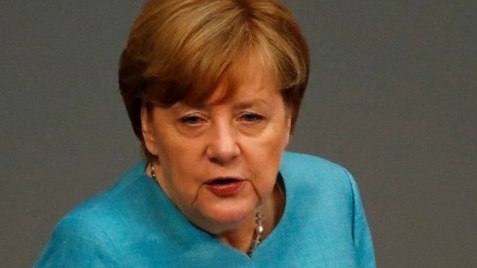 Angela Merkel talks to the German parliament