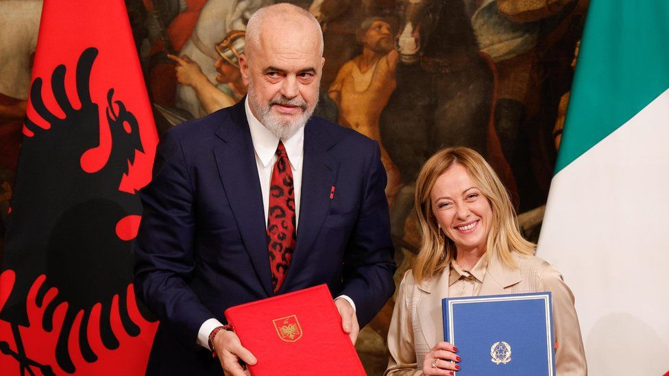 Albania's Edi Rama and Italy's Giorgia Meloni smiling at a press conference in Rome