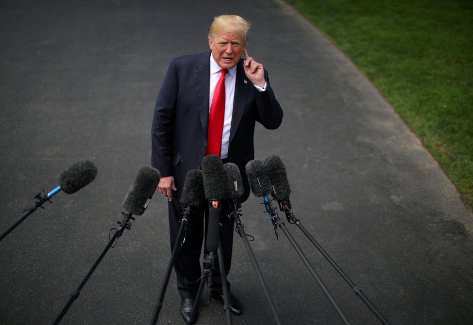 US President Donald Trump speaks to the media before departing the White House for a trip to New York, in Washington, U.S. May 23, 2018