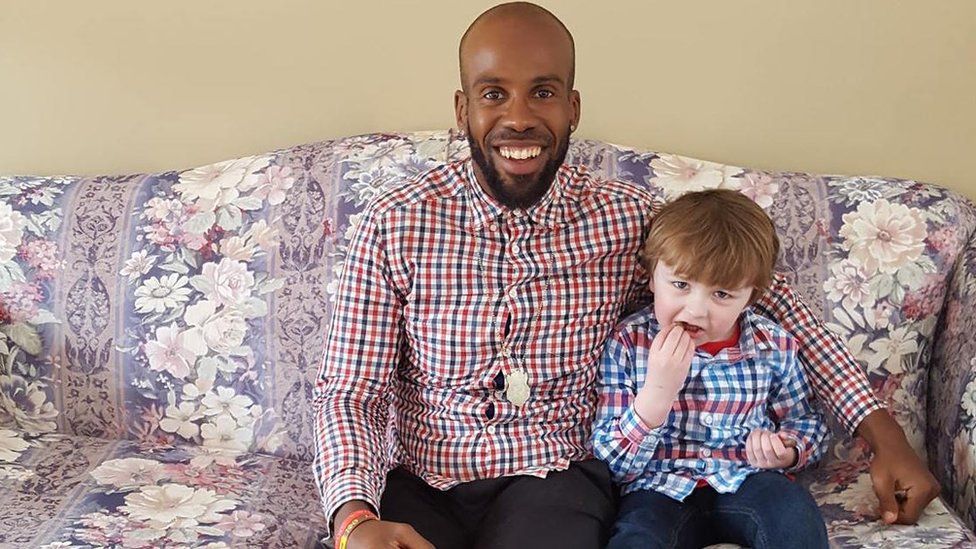 Michael Menafee (left) with Jaxson Slade, after meeting for the first time.