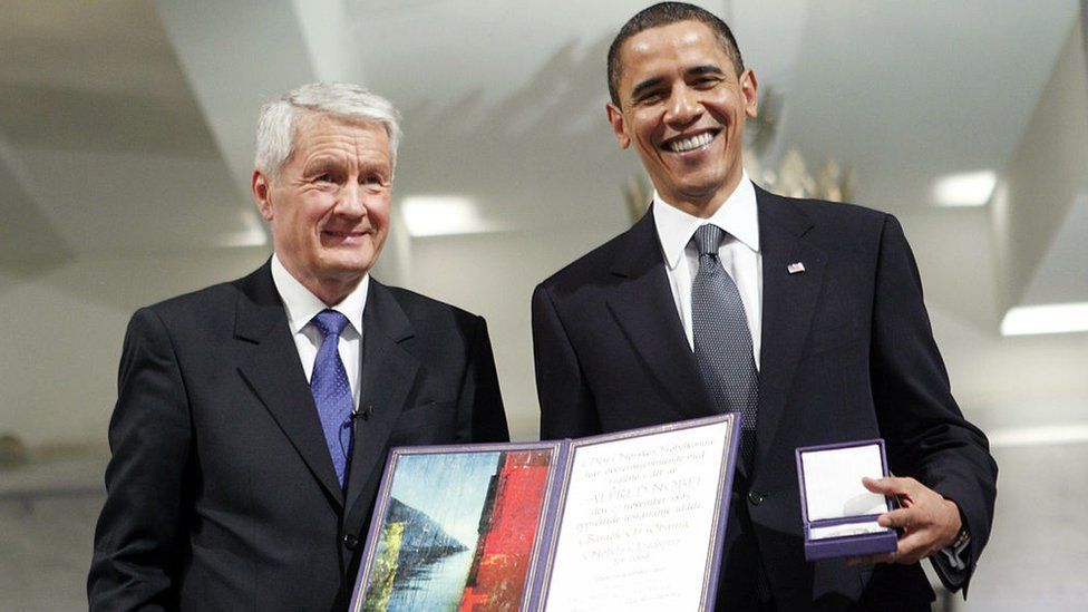 Barack Obama (right) with his Nobel Peace Prize alongside Thorbjoern Jagland of Norway's Nobel Committee