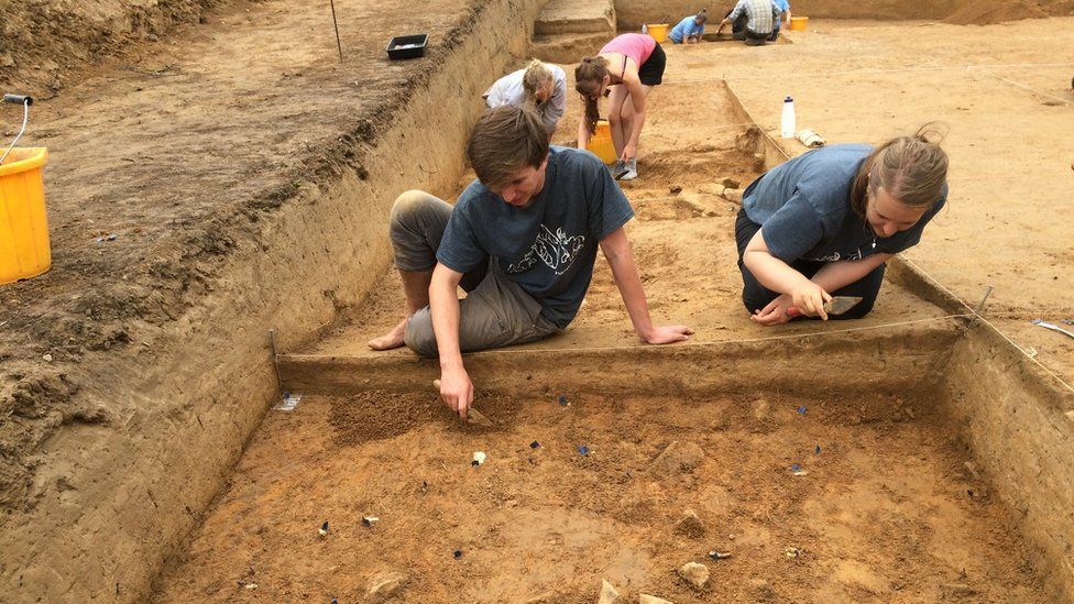 archaeologists at work in the dig site