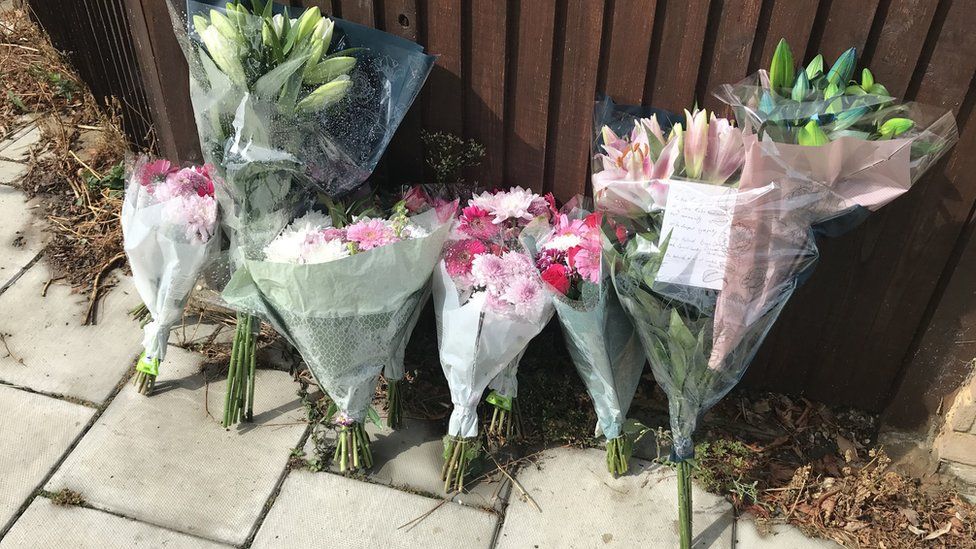 Floral tributes at the scene in Kirkstall Gardens, Streatham Hill, south London, where rapper Chris Kaba was shot by armed officers