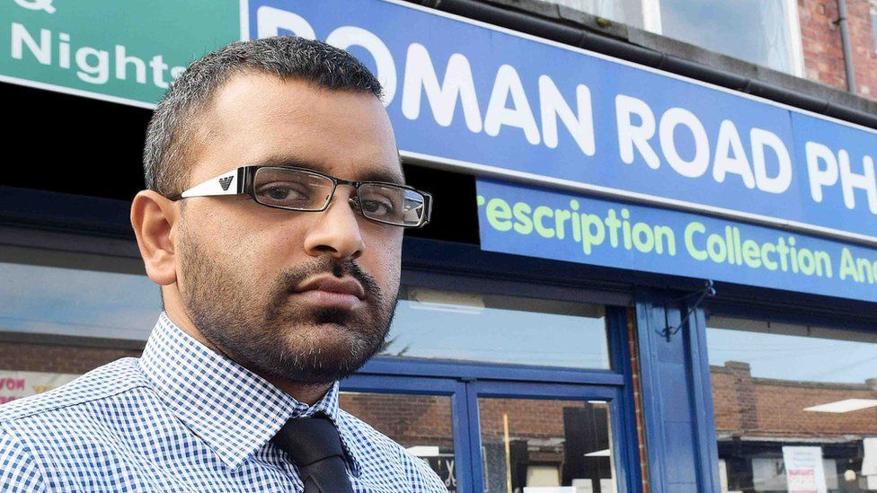 Mitesh Patel outside the pharmacy where he worked