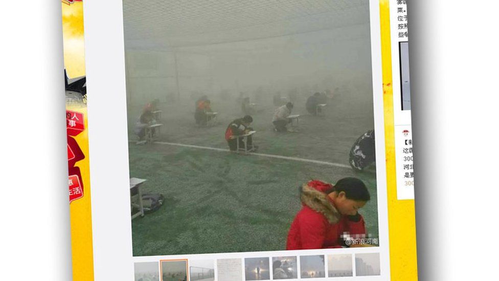 Students in China sit an exam surrounded by heavy smog