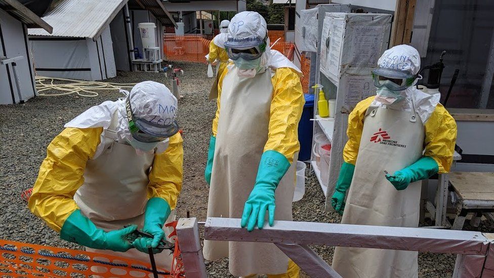 Health workers at an Ebola treatment facility in Sierra Leone