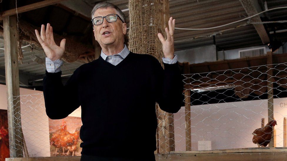 Billionaire philanthropist and Microsoft's co-founder Bill Gates speaks to the media in front of a chicken coop in New York