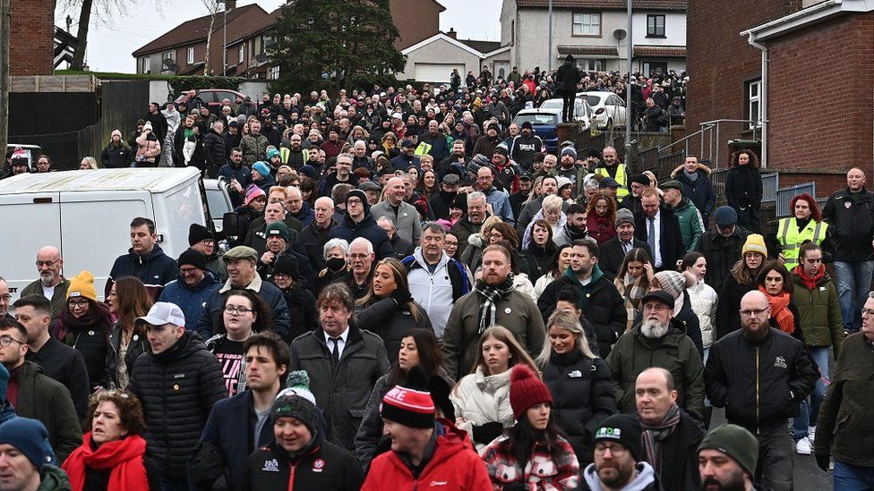 Hundreds of people lined the streets of Derry