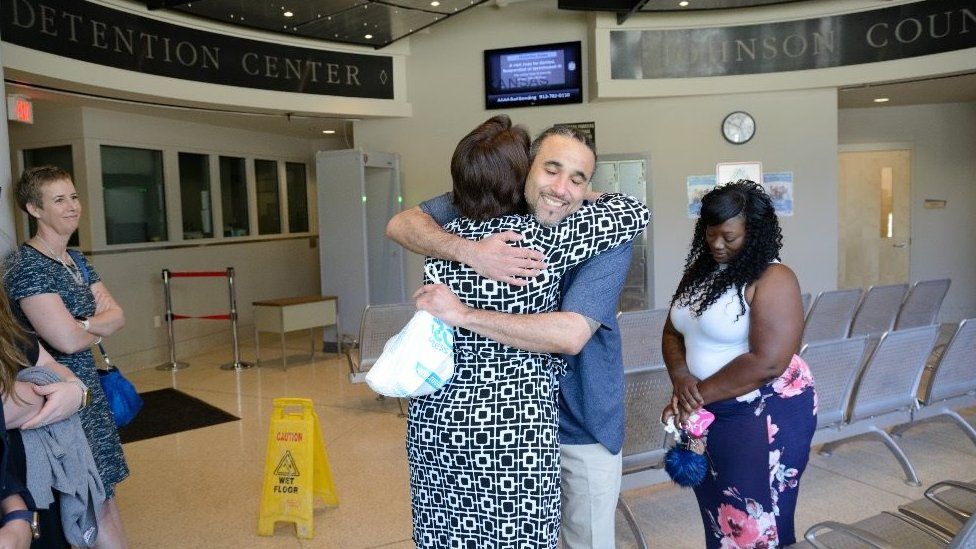 Richard Anthony Jones celebrates with his family after being released from jail