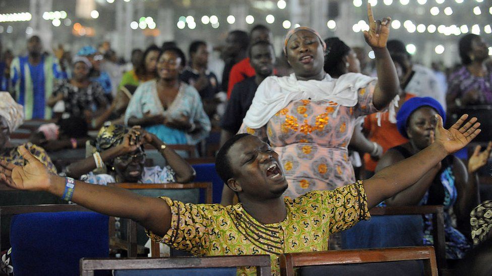 Worshippers pray into the New Year during the crossover watch night church service at the Redemption Camp on Lagos Ibadan highway on January 1, 2014.