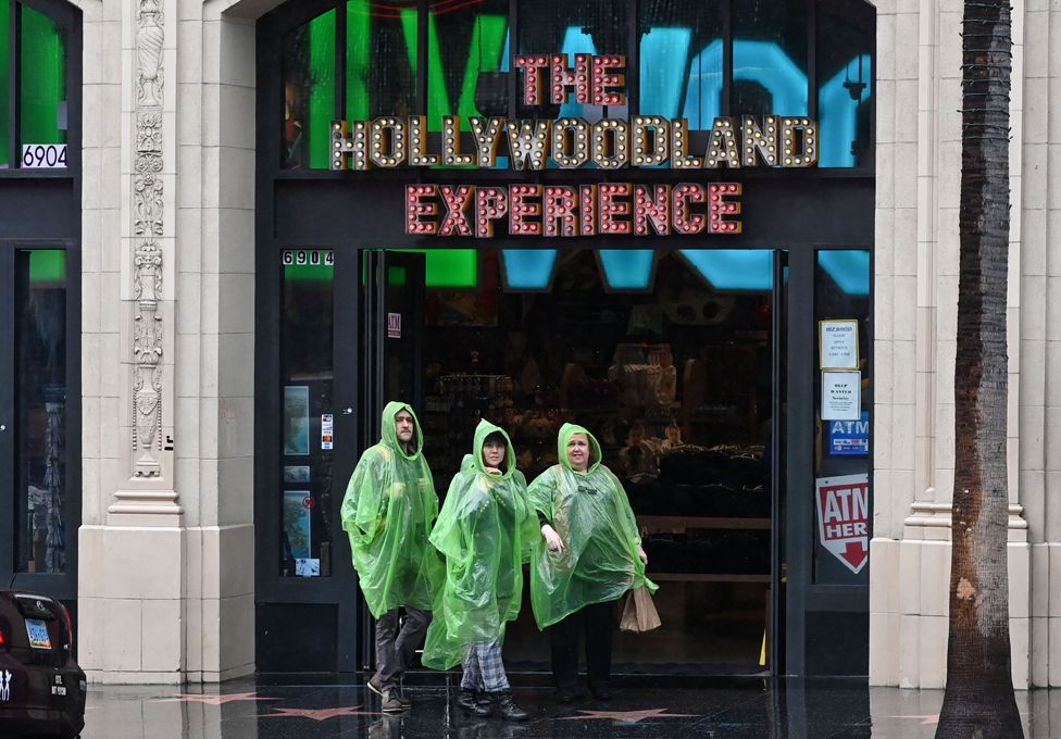 Rainsoaked visitors to the Hollywoodland experience