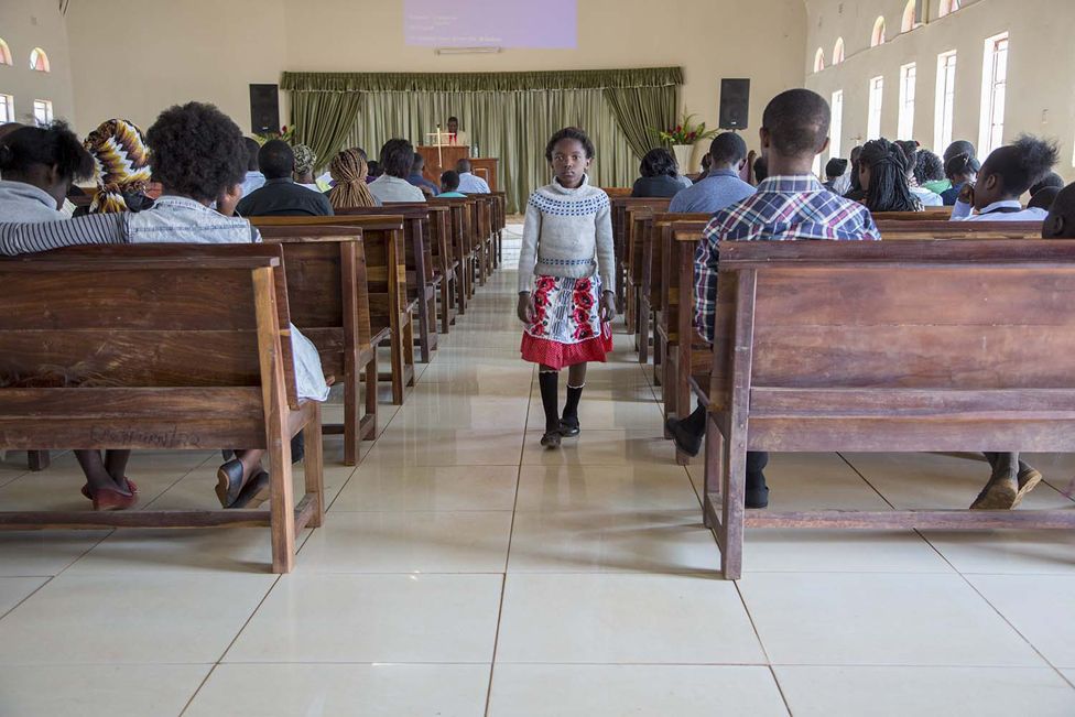 A girl attends a Baptist church service