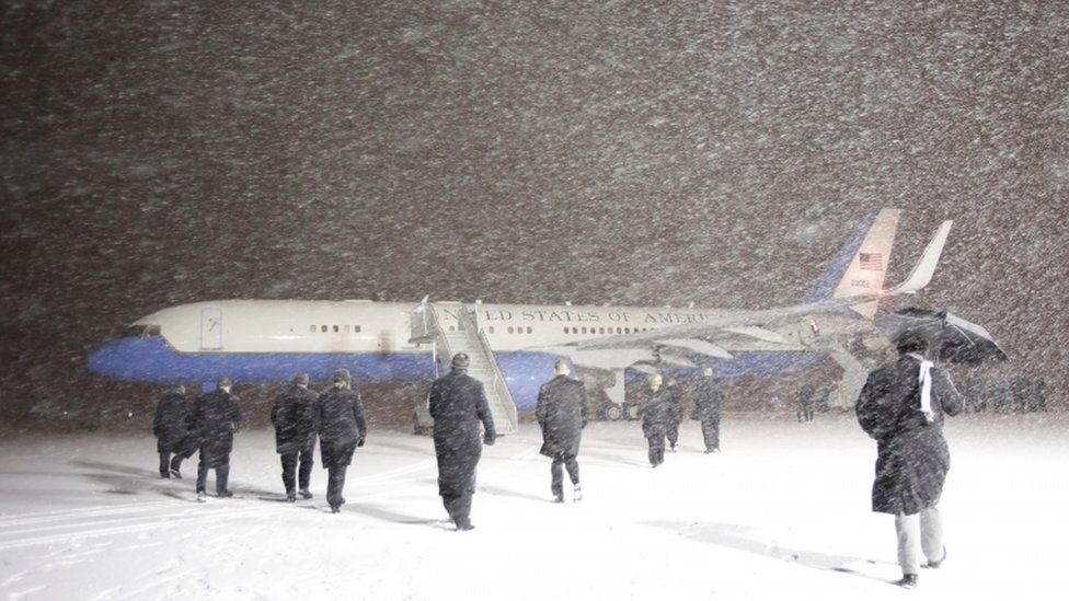 Mr Biden's plane arrives in Ottawa during snowstorm