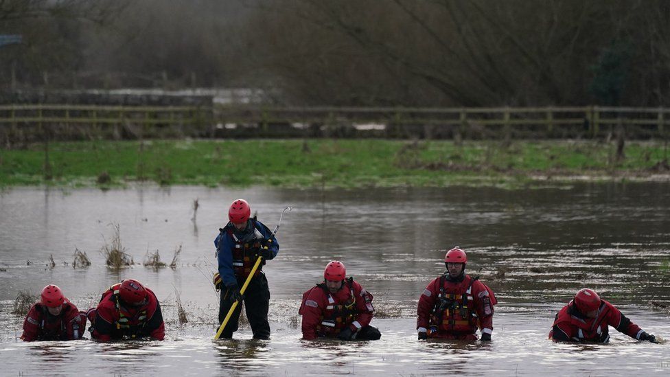 Search teams in the water
