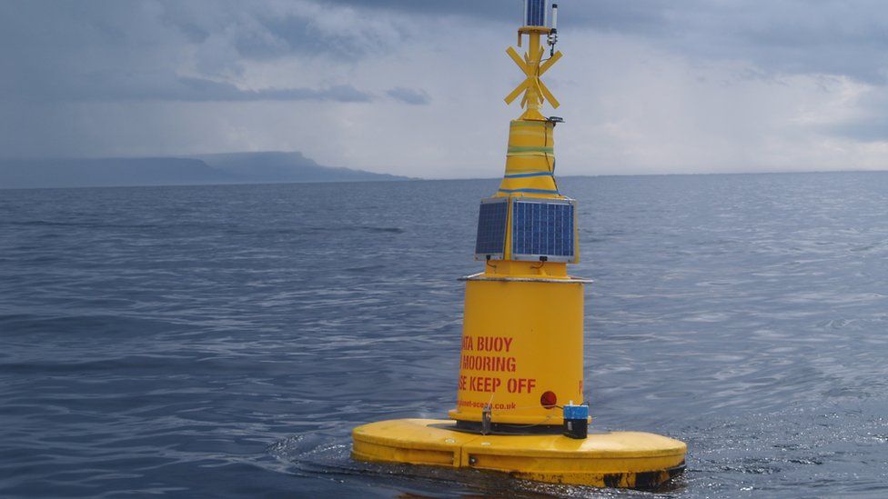 Yellow buoy at sea