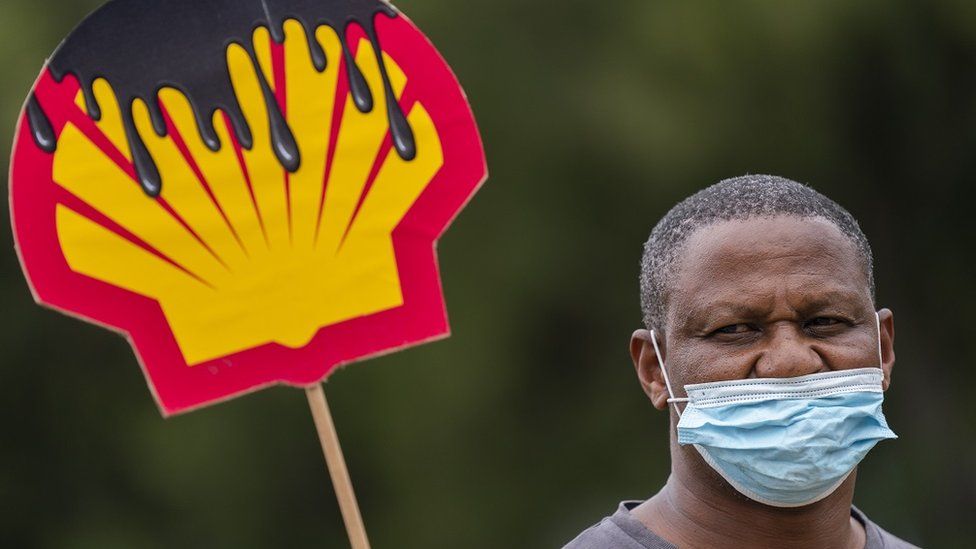 Environmental activists protest against Shell outside the Petroleum Agency of South Africa in Cape Town, South Africa 26 November 2021