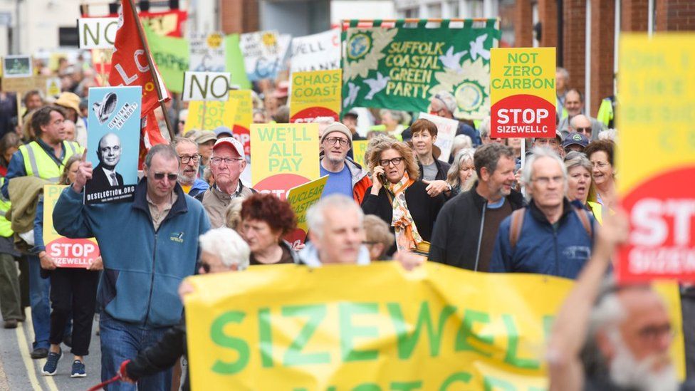Protesters marching against Sizewell C nuclear plant in Suffolk