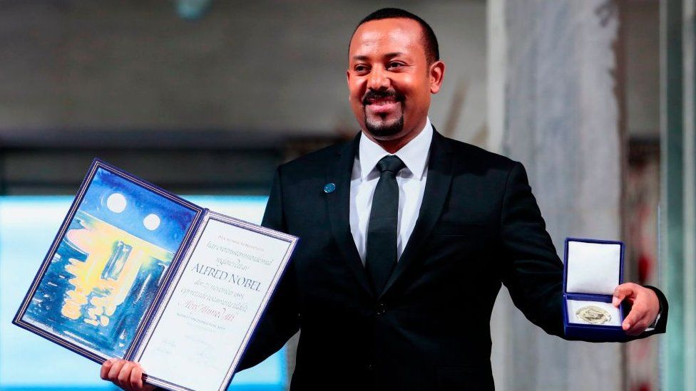 Ethiopia's Prime Minister and Nobel Peace Prize Laureate Abiy Ahmed Ali poses after he was awarded the Nobel Peace Prize during a ceremony at the city hall in Oslo on December 10, 2019