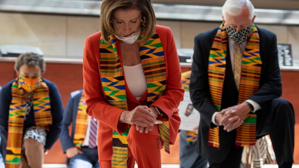 Democrats in kente scarves kneel in moment of silence for George Floyd
