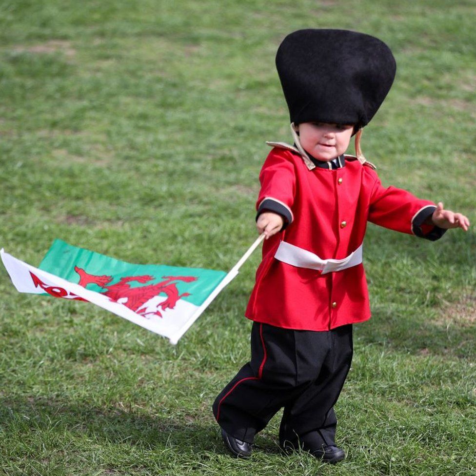 One child dressed as a member of the Royal Guard