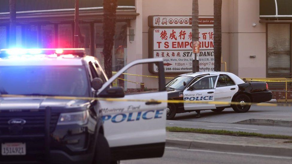 Monterey Park Police vehicles after a mass shooting at a dance studio in Monterey Park